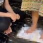 Video seorang perempuan dipaksa sumpah dengan menginjak Alquran viral di medsos.(Foto: Istimewa)