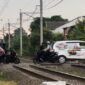 Perlintasan KA di Bulak Kapal Bekasi Timur kini dijaga petugas resmi dari Dishub Kota Bekasi,(Foto: Hymas Pemkot Bekasi)
